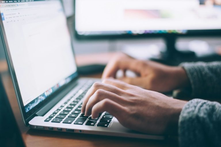 Laptop in use symbolising expert freelance writing services available on retainer or for quick-turnaround projects