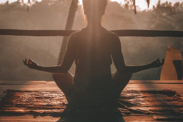 Person meditating, symbolising Shani Shaker’s expert writing in health, wellness, and nutrition communications